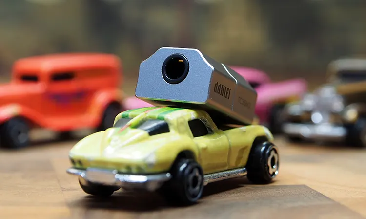 ddHiFi TC35M2 on top of a yellow toy car