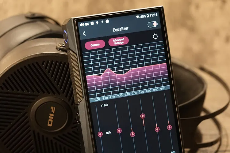 FiiO M23 in front of FiiO FT5 headphones